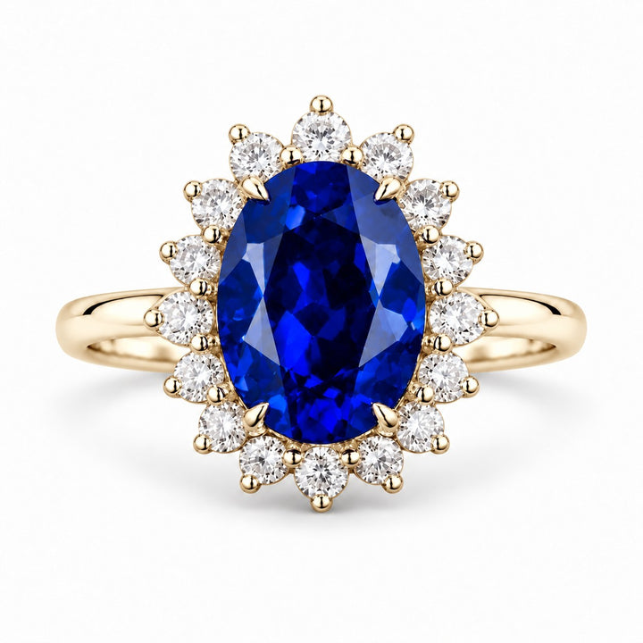 The Diana Royale — Royal Blue Sapphire Diamond Halo Ring in 14K yellow gold, front view