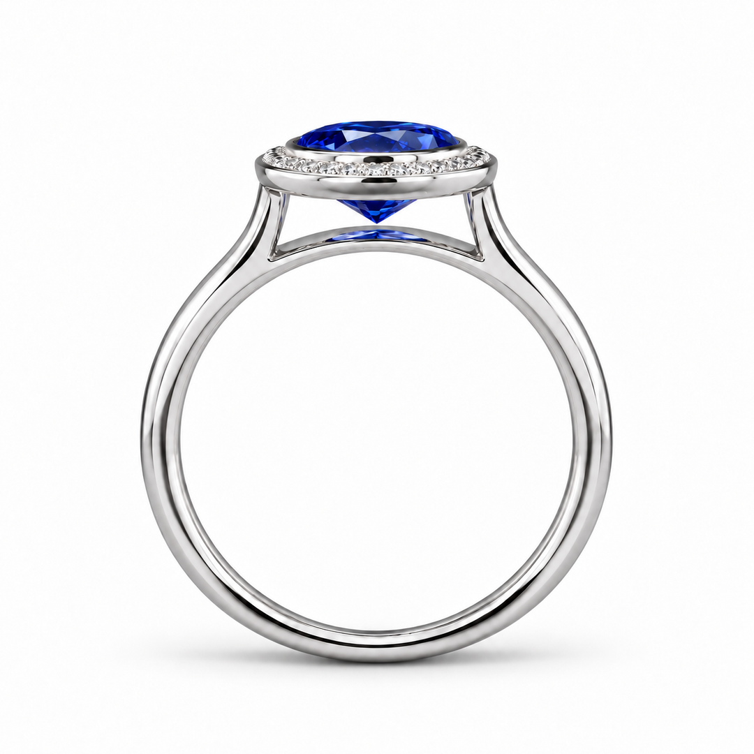 The Celine vintage lab sapphire halo ring in platinum, profile view