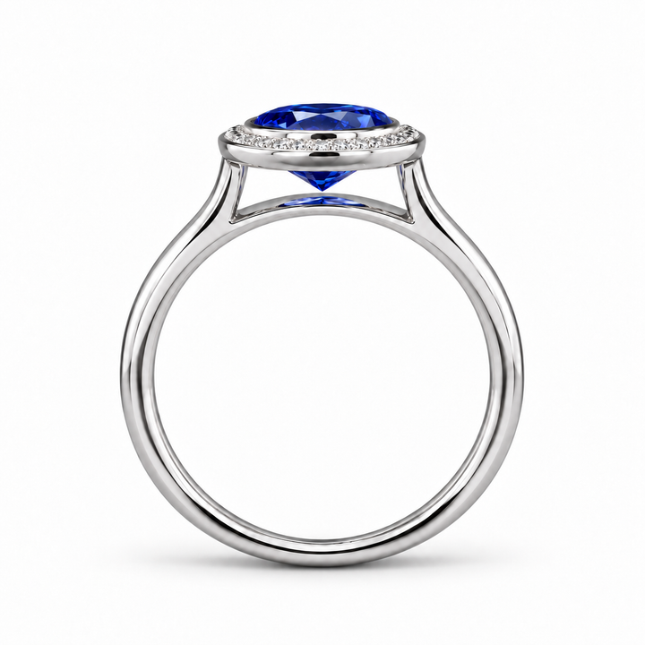 The Celine vintage lab sapphire halo ring in platinum, profile view