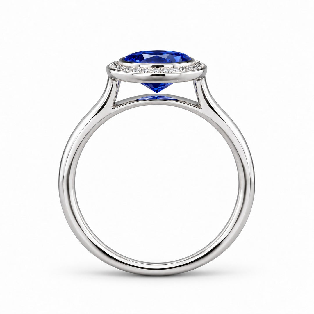 The Celine vintage lab sapphire halo ring in 14K white gold, profile view