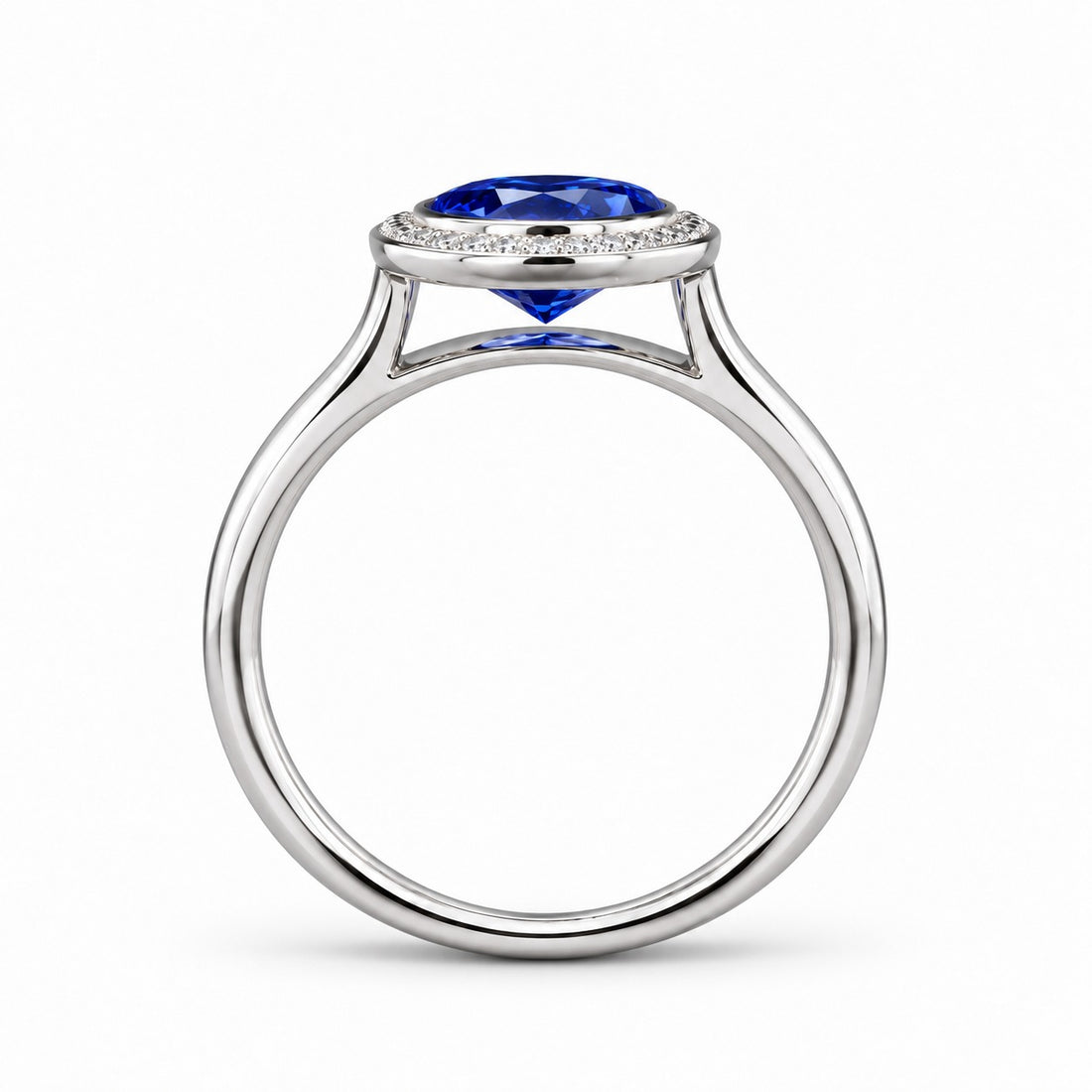 The Celine vintage lab sapphire halo ring in 14K white gold, profile view