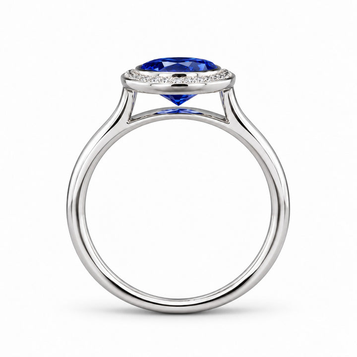 The Celine vintage lab sapphire halo ring in 14K white gold, profile view