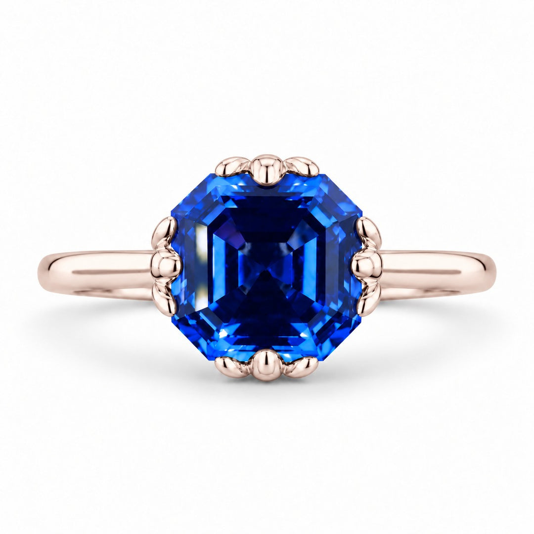 The Verena — Blue Asscher Sapphire with Leaf Prongs Ring in 14K rose gold, front view