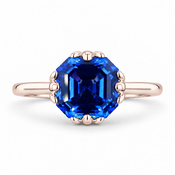 The Verena — Blue Asscher Sapphire with Leaf Prongs Ring in 14K rose gold, front view
