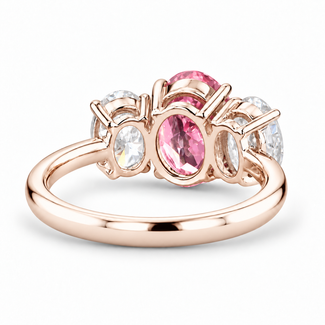 The Étoile oval pink lab sapphire three-stone ring in 14K rose gold, back view