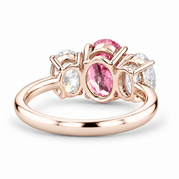 The Étoile oval pink lab sapphire three-stone ring in 14K rose gold, back view