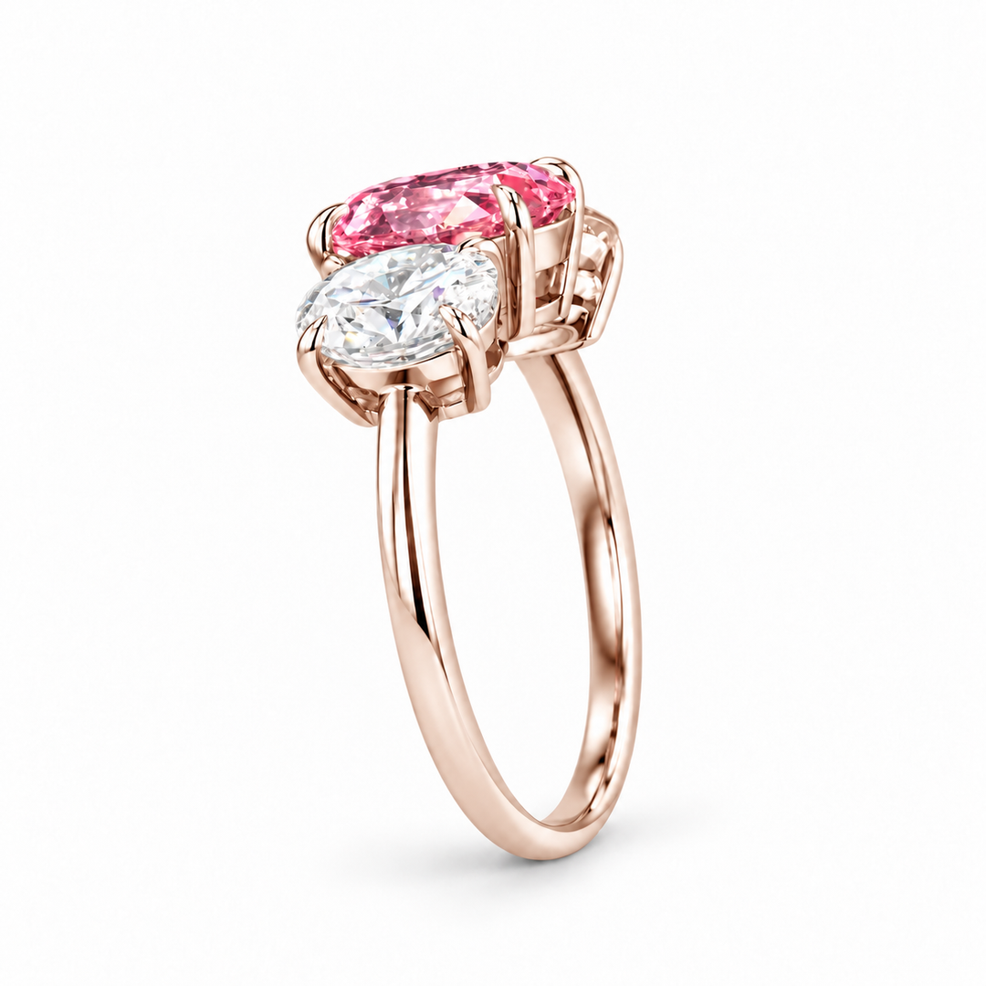 The Étoile oval pink lab sapphire three-stone ring in 14K rose gold, profile view