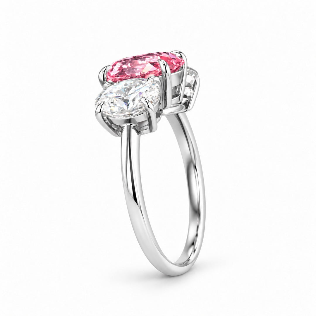 The Étoile oval pink lab sapphire three-stone ring in 14K white gold, profile view