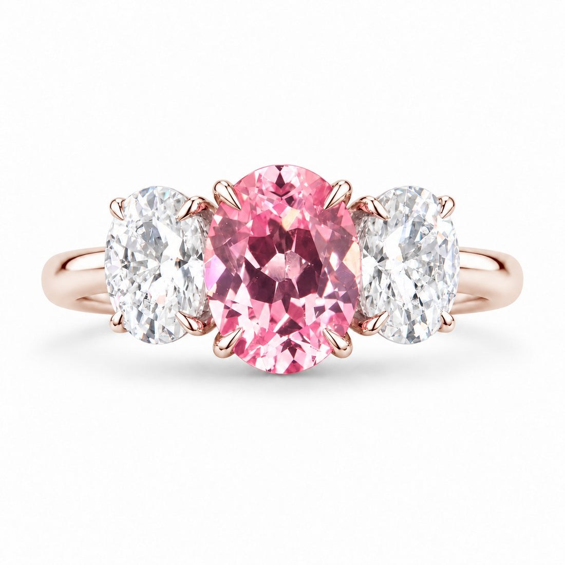 The Étoile — Oval Three-Stone Pink Sapphire Ring in 14K rose gold, front view