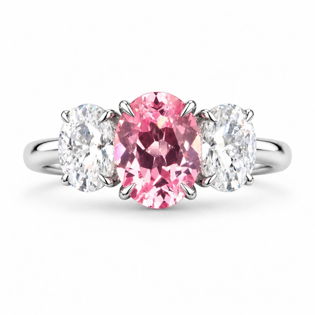The Étoile — Oval Three-Stone Pink Sapphire Ring in 14K white gold, front view