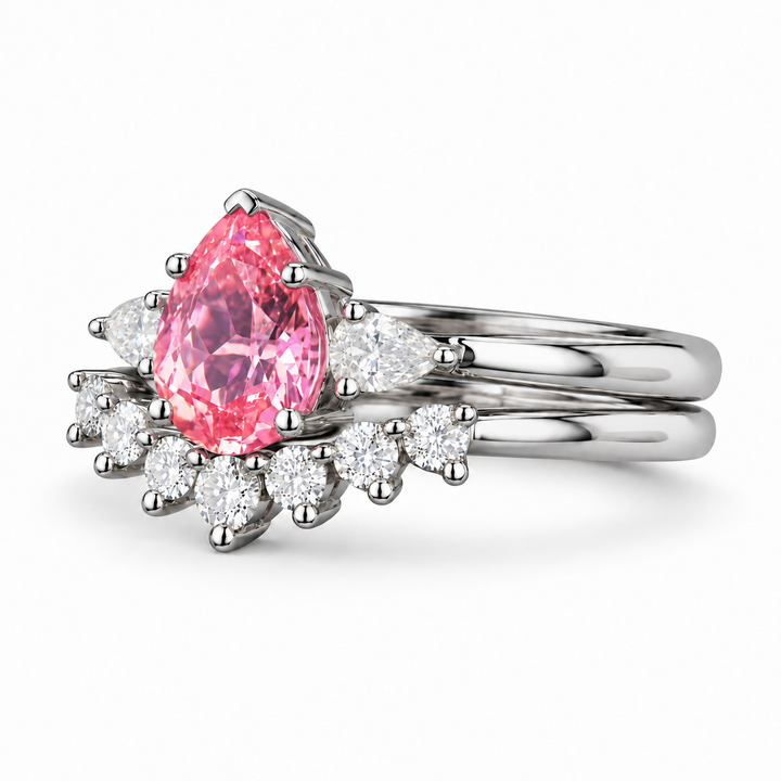 The Aubrey Set pink pear sapphire three-stone ring and diamond band in platinum, angled view