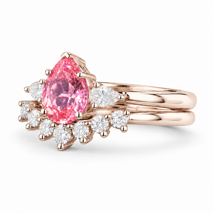 The Aubrey Set pink pear sapphire three-stone ring and diamond band in 14K rose gold, angled view