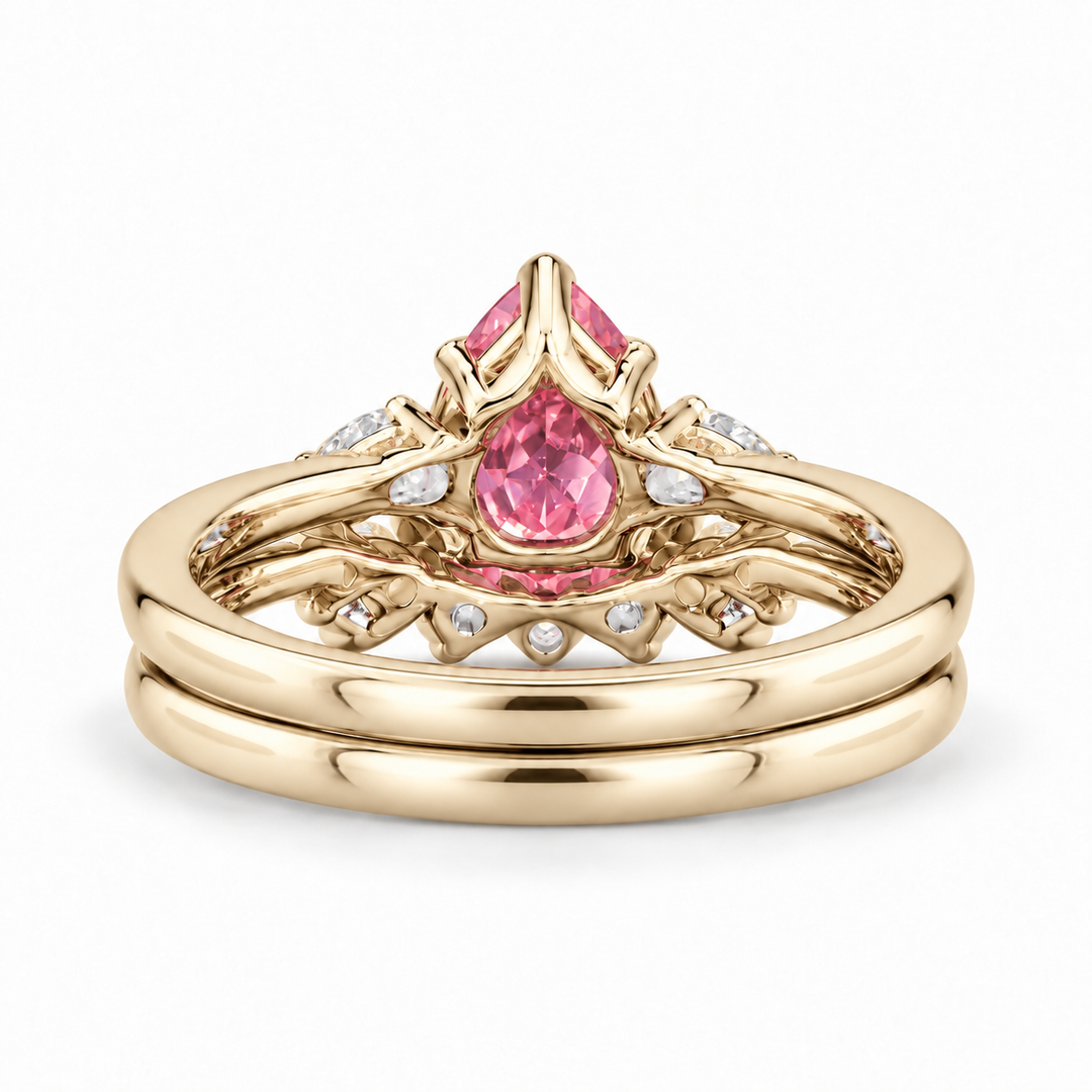 The Aubrey Set pink pear sapphire three-stone ring and diamond band in 14K yellow gold, back view