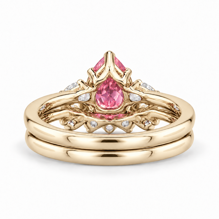 The Aubrey Set pink pear sapphire three-stone ring and diamond band in 14K yellow gold, back view