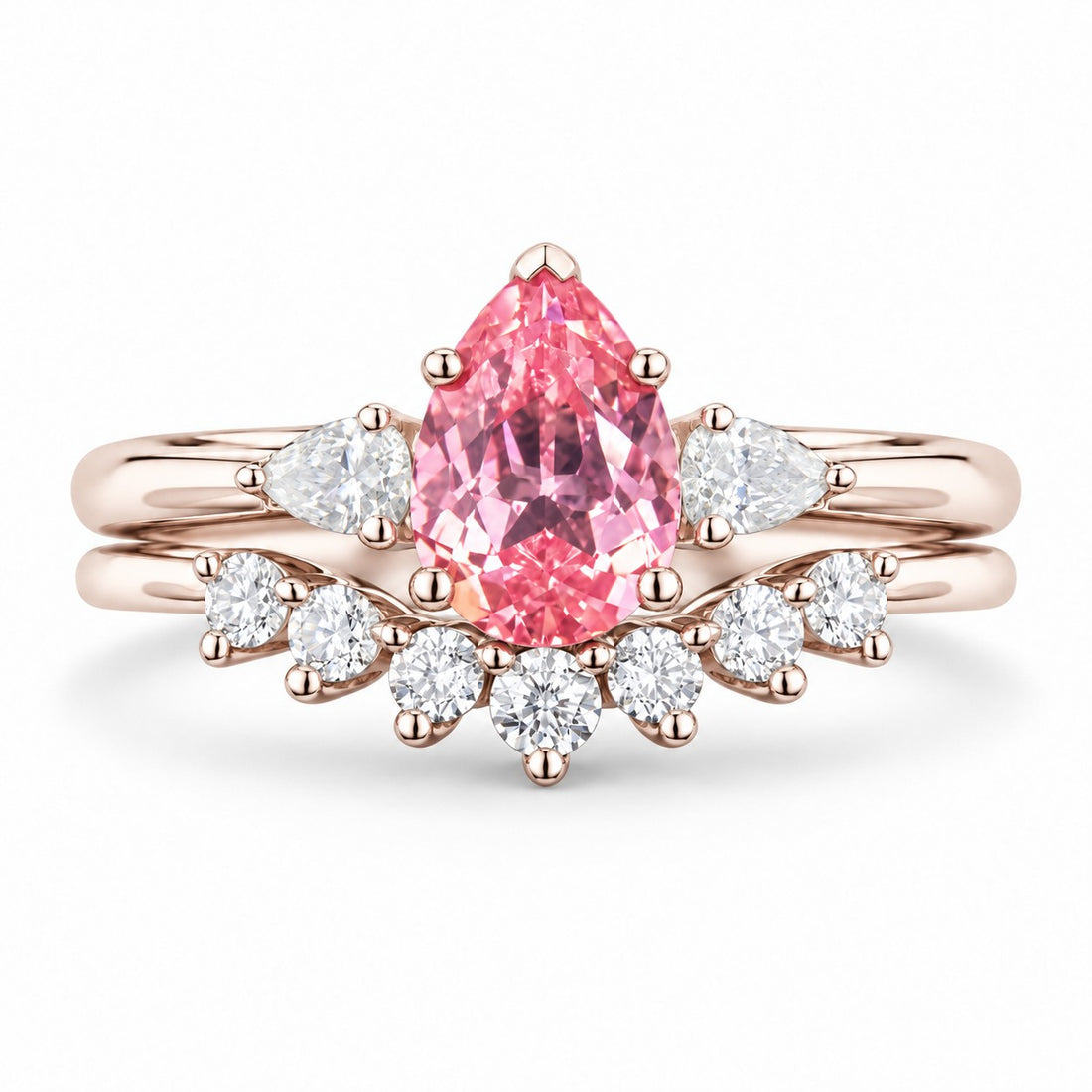 The Aubrey Set — Pink Pear Sapphire Three-Stone Ring with Diamond Stacking Band in 14K rose gold, front view