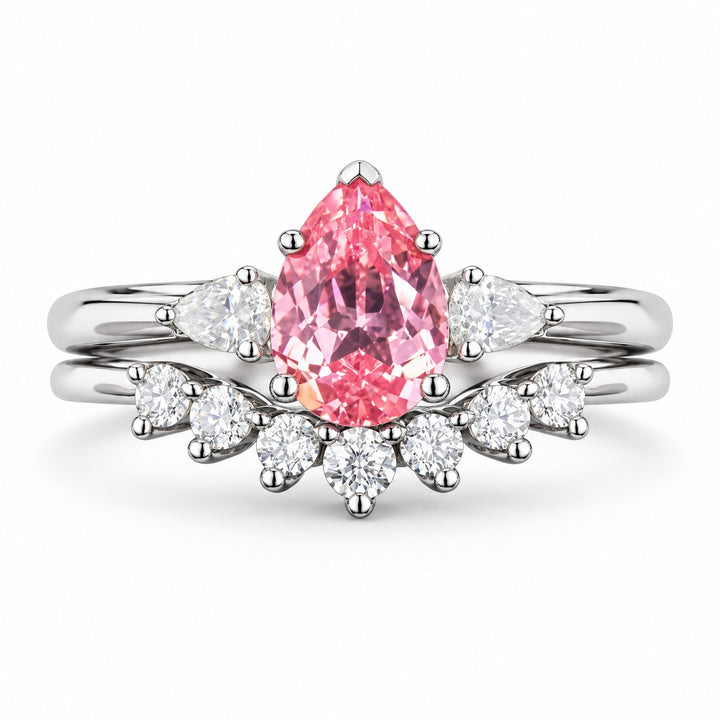The Aubrey Set — Pink Pear Sapphire Three-Stone Ring with Diamond Stacking Band in 14K white gold, front view