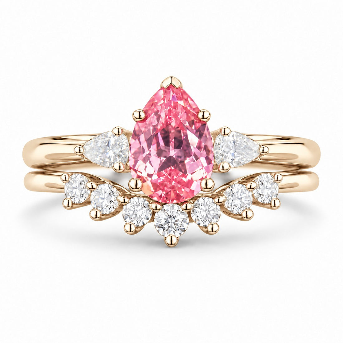 The Aubrey Set — Pink Pear Sapphire Three-Stone Ring with Diamond Stacking Band in 14K yellow gold, front view