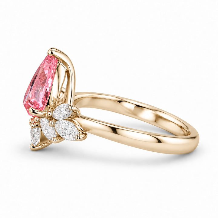The Lily pink pear sapphire floral ring in 14K yellow gold, side view