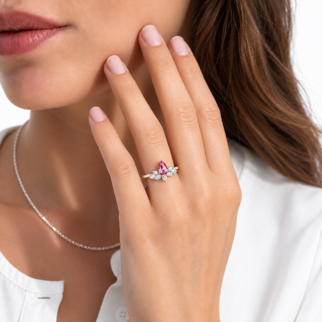 The Lily pink pear sapphire floral ring in 14K rose gold, worn on hand