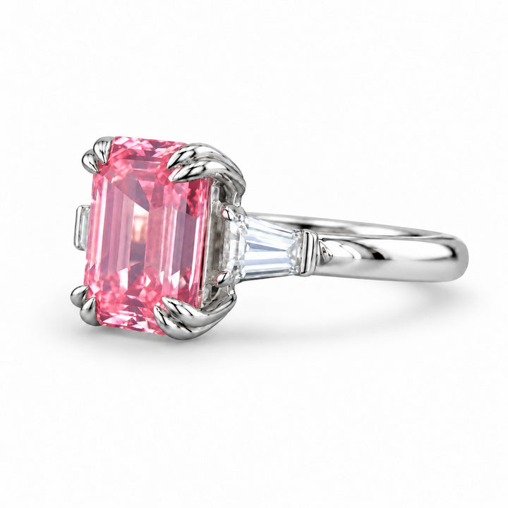 The Lumen pink lab sapphire baguette ring in platinum, angled view