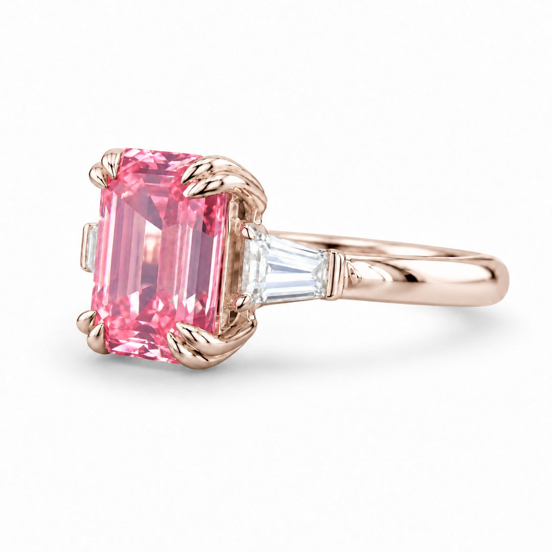 The Lumen pink lab sapphire baguette ring in 14K rose gold, angled view