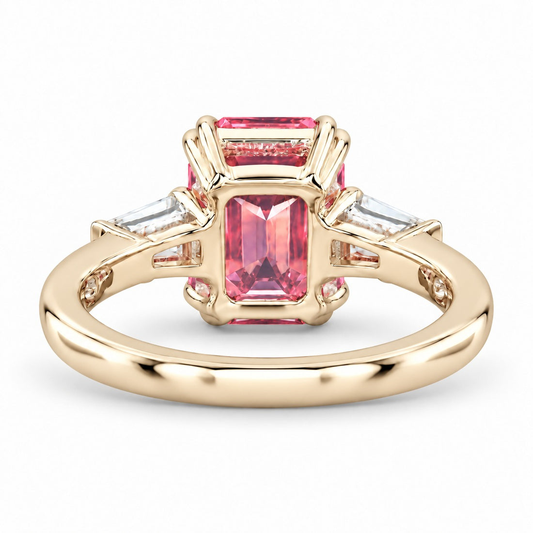 The Lumen pink lab sapphire baguette ring in 14K yellow gold, back view