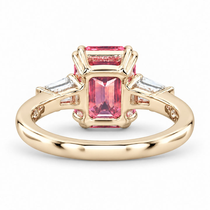 The Lumen pink lab sapphire baguette ring in 14K yellow gold, back view