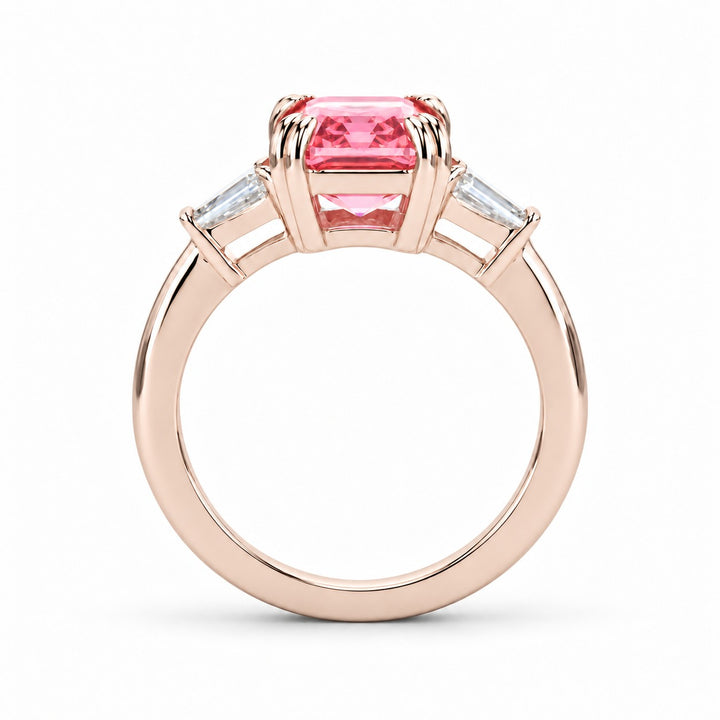 The Lumen pink lab sapphire baguette ring in 14K rose gold, profile view