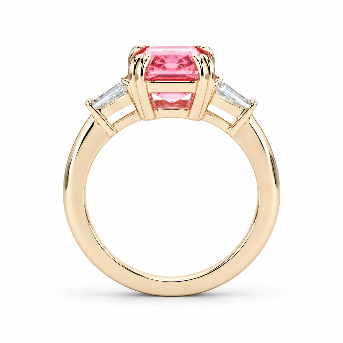 The Lumen pink lab sapphire baguette ring in 14K yellow gold, profile view