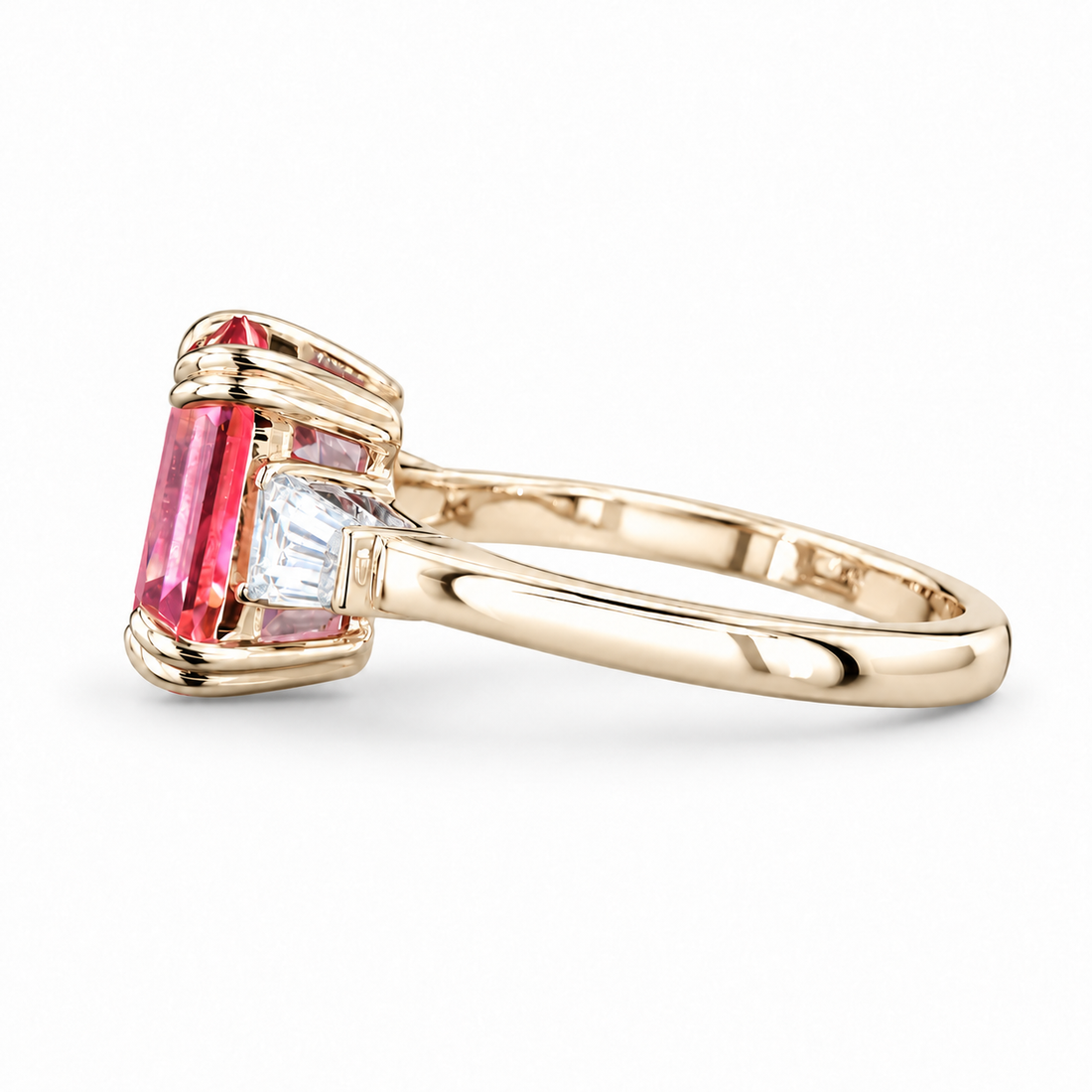 The Lumen pink lab sapphire baguette ring in 14K yellow gold, side view