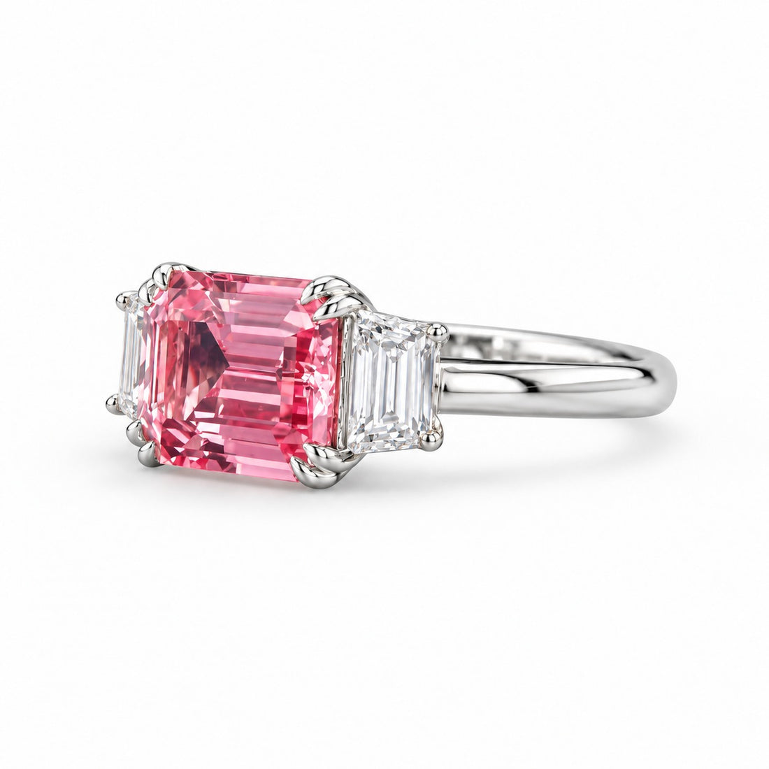 The Maribel pink lab sapphire three-stone ring in 14K white gold, angled view