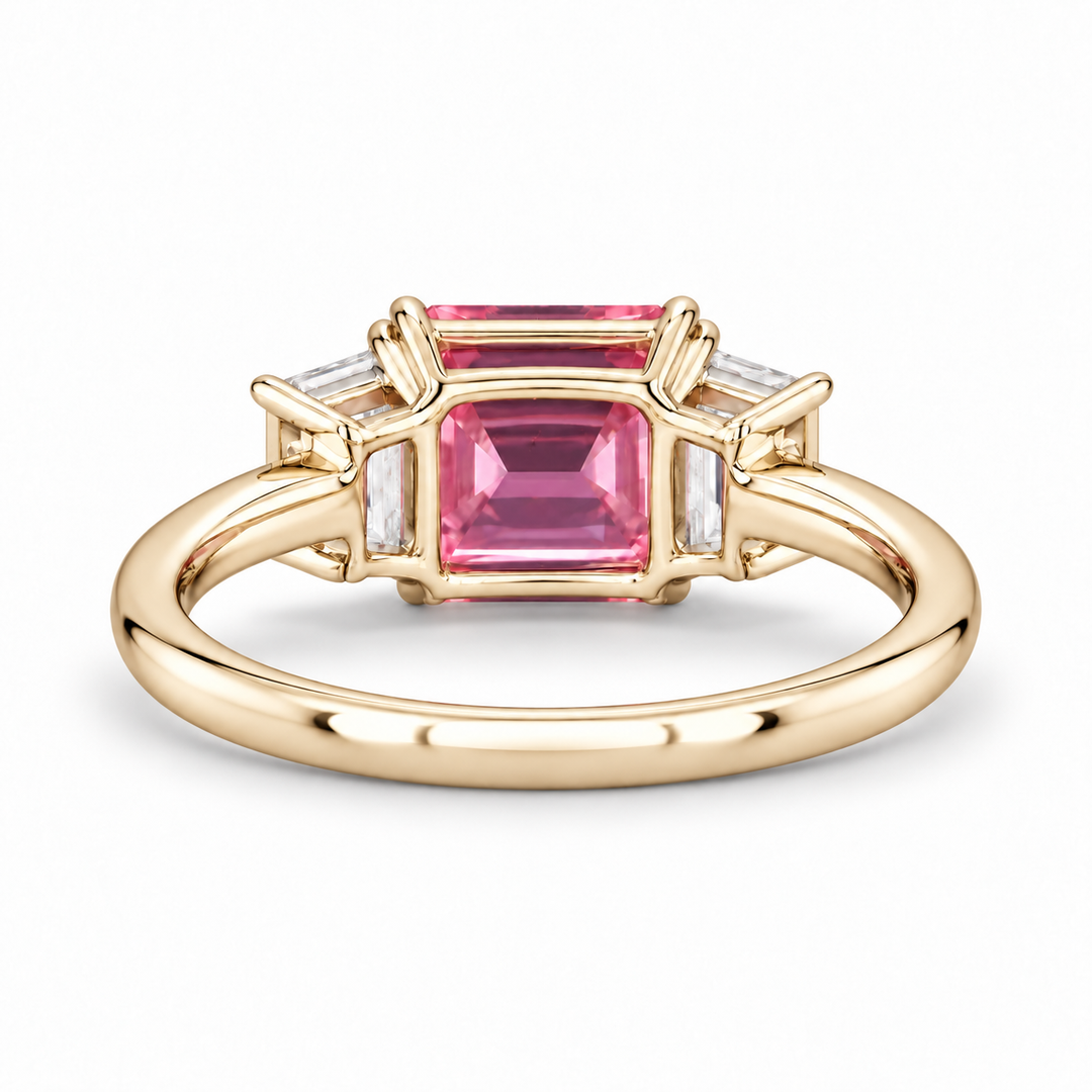 The Maribel pink lab sapphire three-stone ring in 14K yellow gold, back view