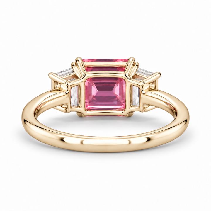 The Maribel pink lab sapphire three-stone ring in 14K yellow gold, back view