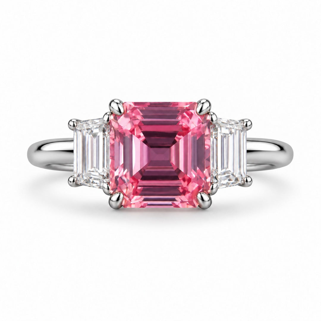 The Maribel — Pink Sapphire Three-Stone Ring in platinum, front view