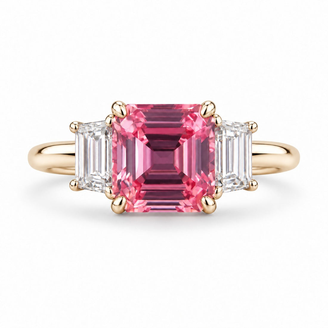 The Maribel — Pink Sapphire Three-Stone Ring in 14K yellow gold, front view