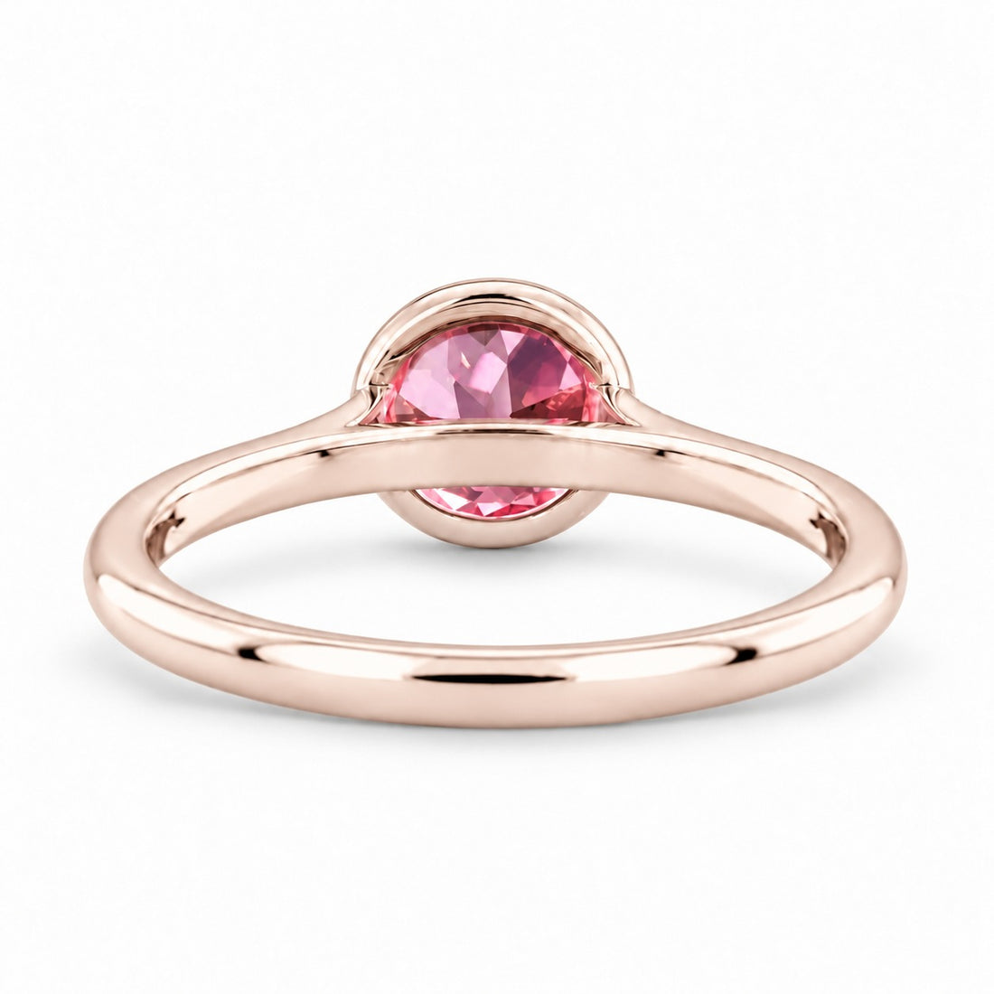 The Lune pink lab sapphire bezel solitaire ring in 14K rose gold, back view