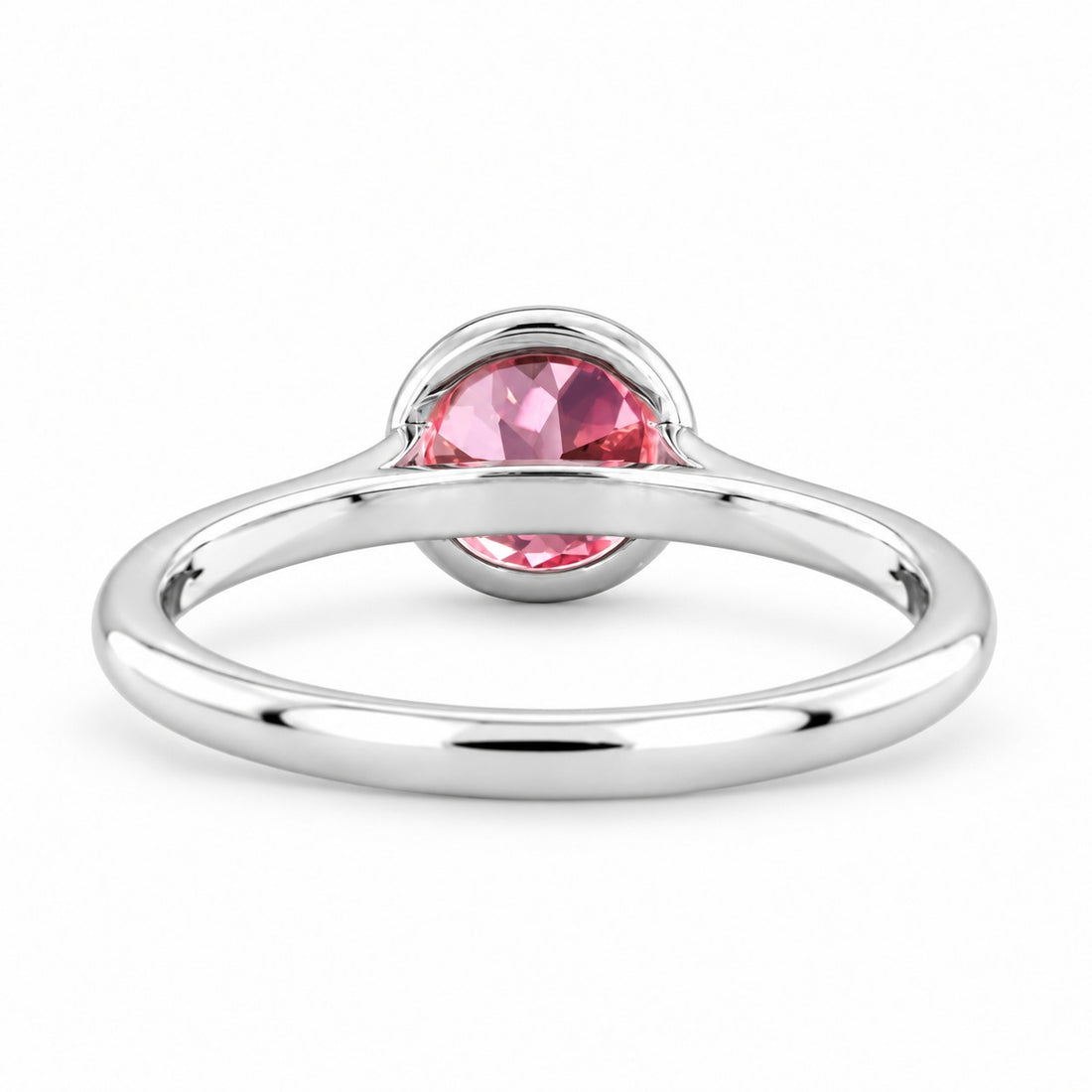 The Lune pink lab sapphire bezel solitaire ring in 14K white gold, back view