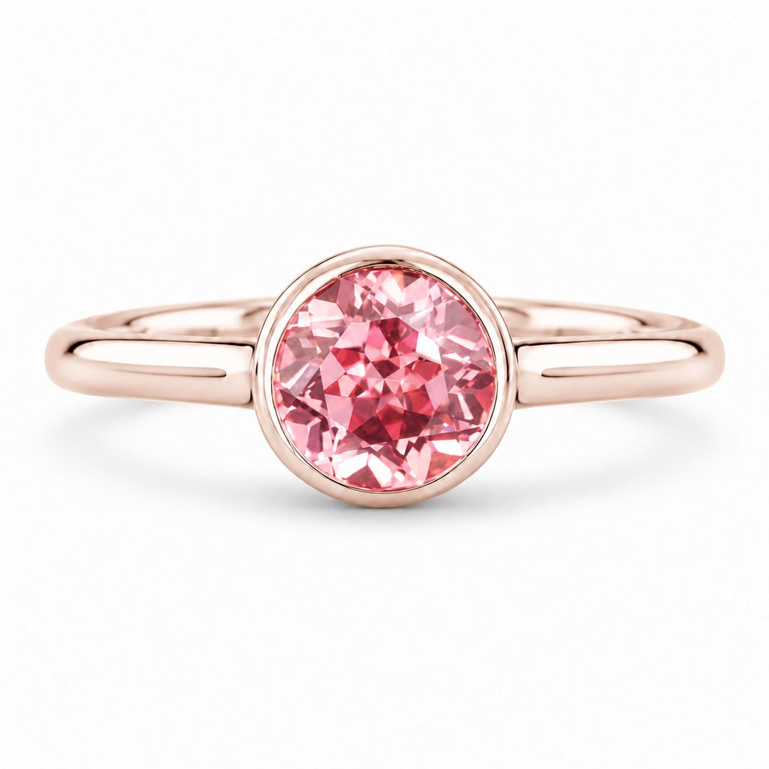 The Lune — Pink Round Sapphire Bezel Solitaire Ring in 14K rose gold, front view