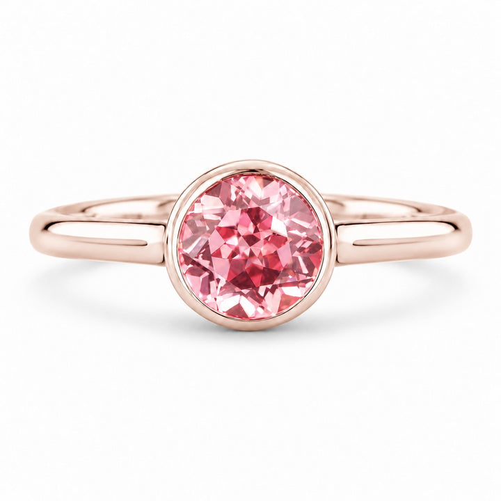 The Lune — Pink Round Sapphire Bezel Solitaire Ring in 14K rose gold, front view