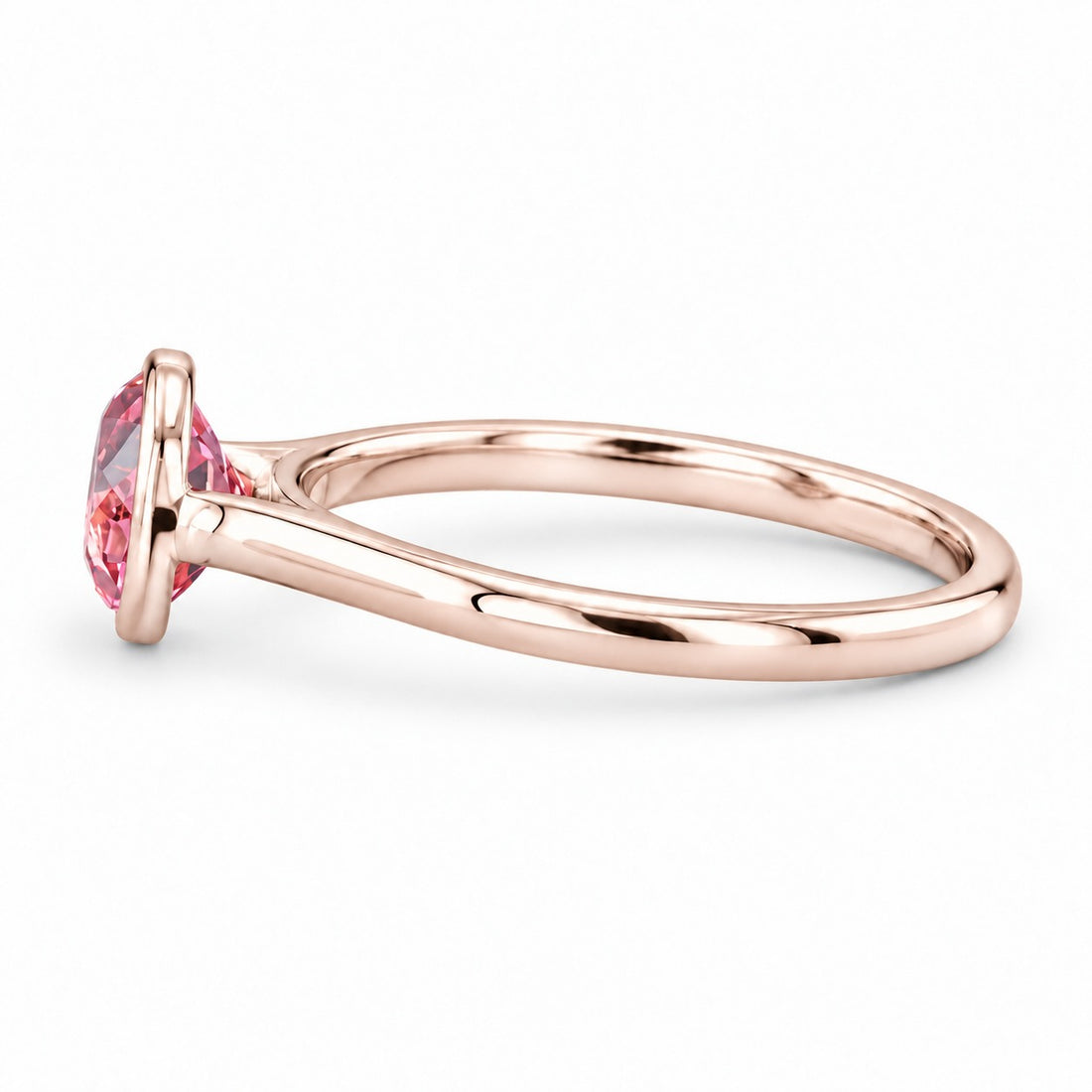 The Lune pink lab sapphire bezel solitaire ring in 14K rose gold, side view