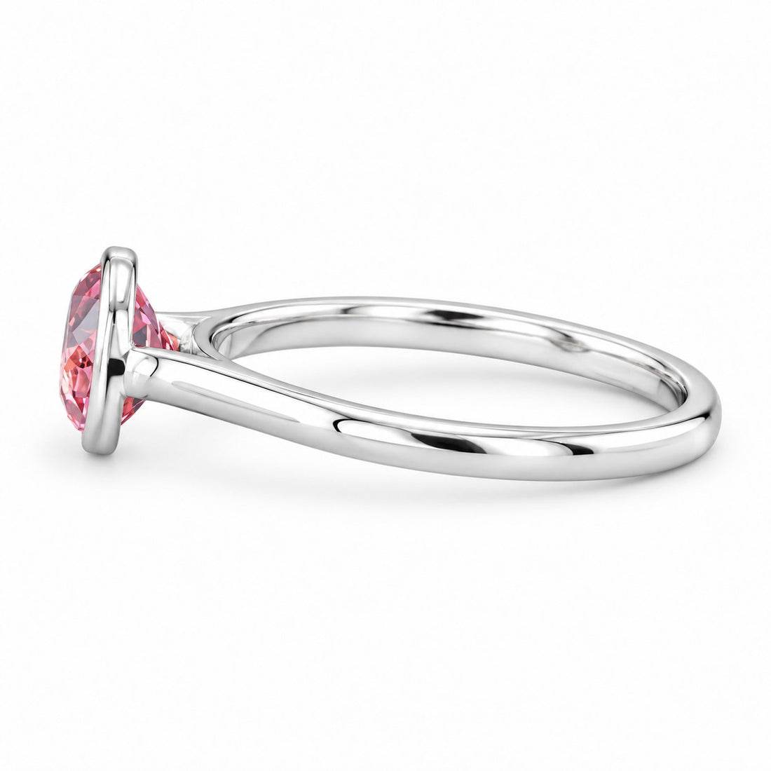 The Lune pink lab sapphire bezel solitaire ring in 14K white gold, side view