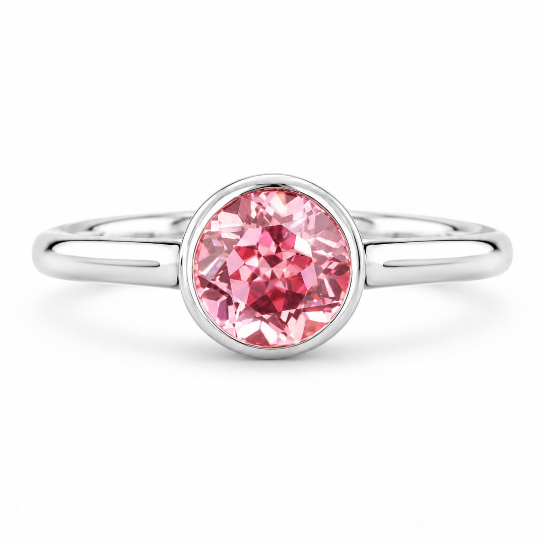 The Lune — Pink Round Sapphire Bezel Solitaire Ring in 14K white gold, front view