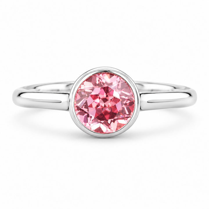 The Lune — Pink Round Sapphire Bezel Solitaire Ring in 14K white gold, front view