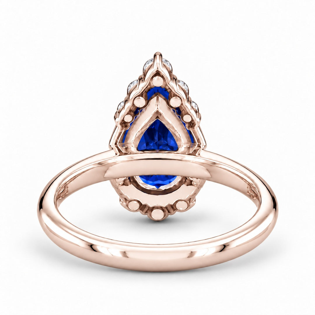 The Teardrop pear blue sapphire ring with diamond halo in 14K rose gold, back view