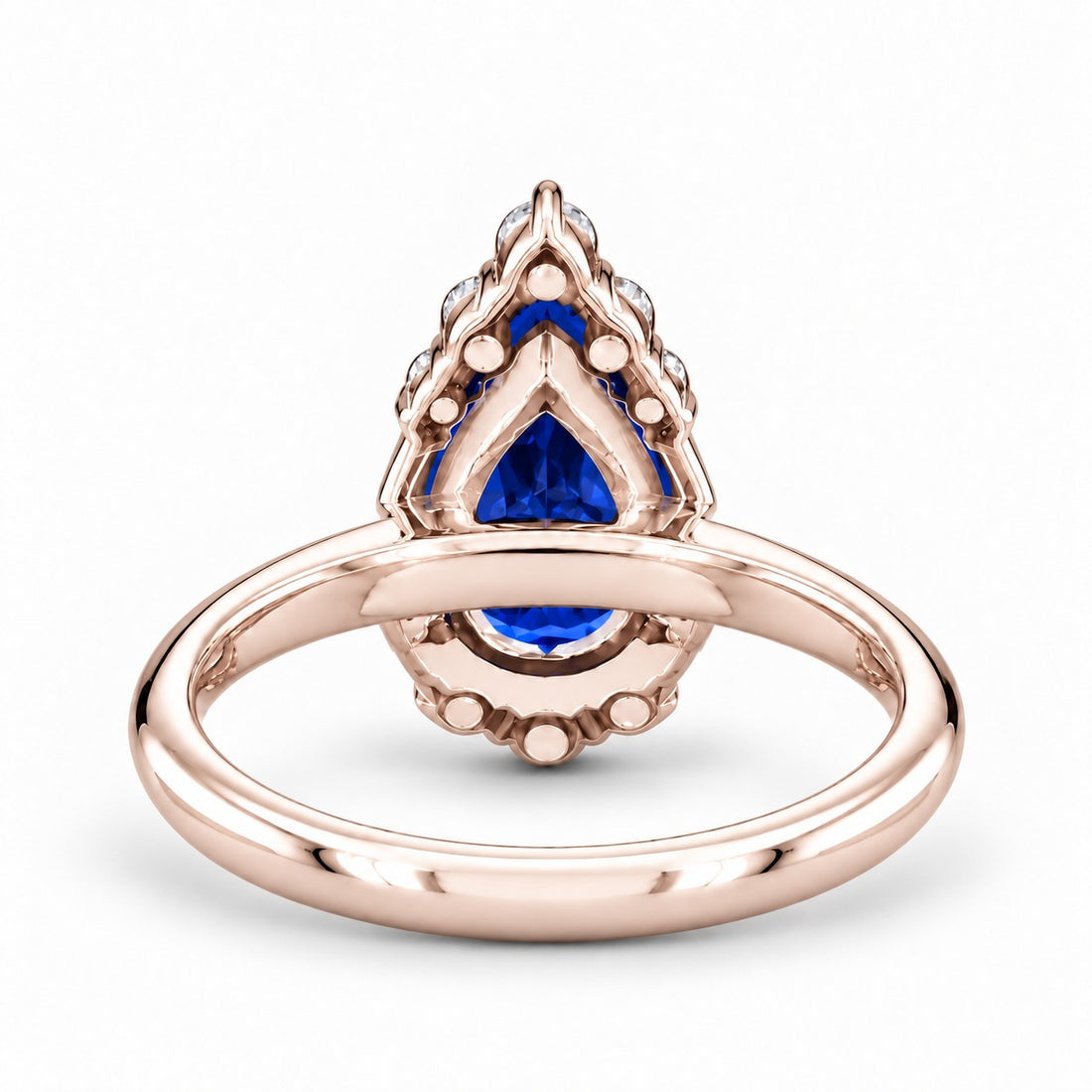 The Teardrop pear blue sapphire ring with diamond halo in 14K rose gold, back view
