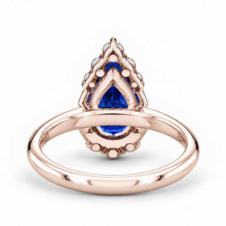The Teardrop pear blue sapphire ring with diamond halo in 14K rose gold, back view