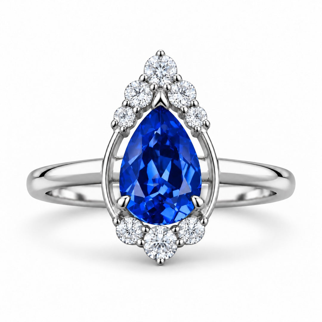 The Teardrop — Blue Pear Sapphire with Diamond Halo Ring in platinum, front view