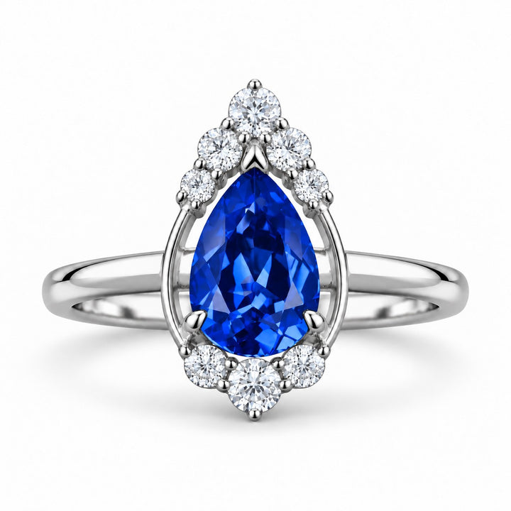 The Teardrop — Blue Pear Sapphire with Diamond Halo Ring in platinum, front view
