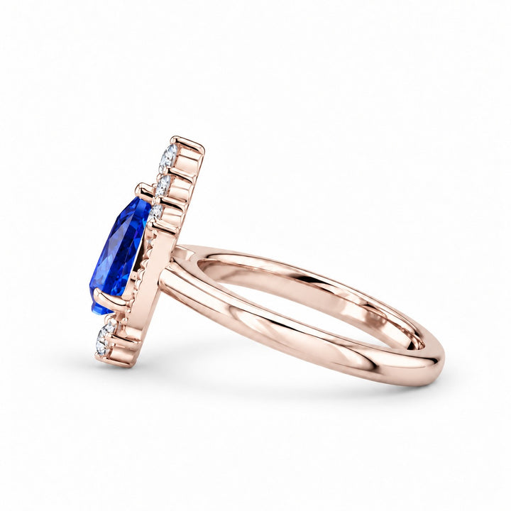 The Teardrop pear blue sapphire ring with diamond halo in 14K rose gold, side view