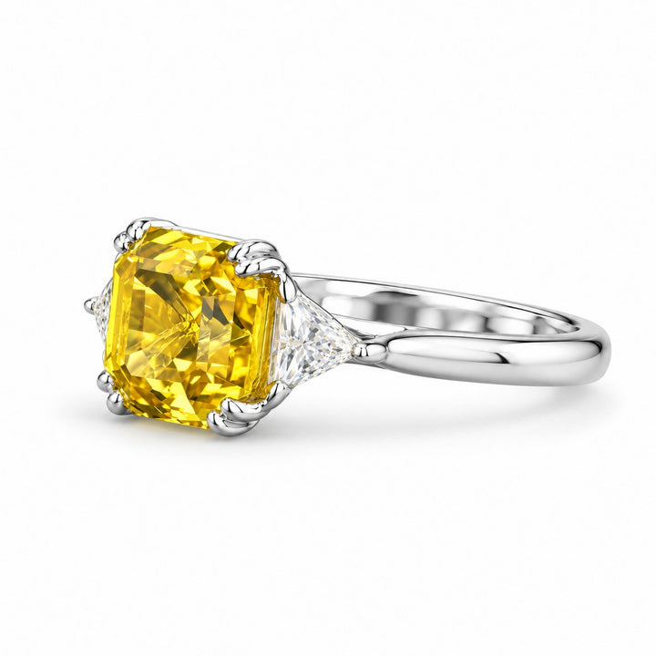 The Sundial asscher yellow lab sapphire three-stone ring in 14K white gold, angled view